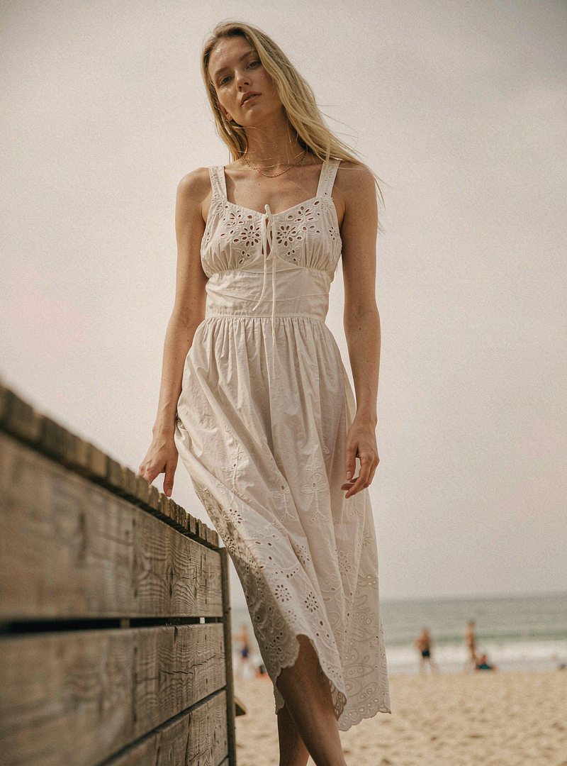 Cleo Broderie Sundress — White, modelled outdoors