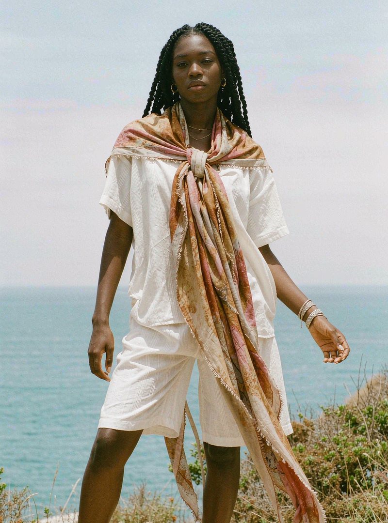 Isola Silk Scarf — Sunfade, modelled outdoors